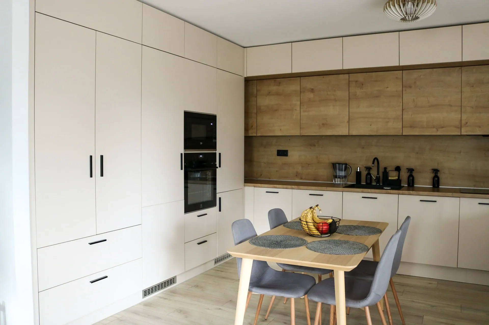 Tall cabinet run with built-in appliances