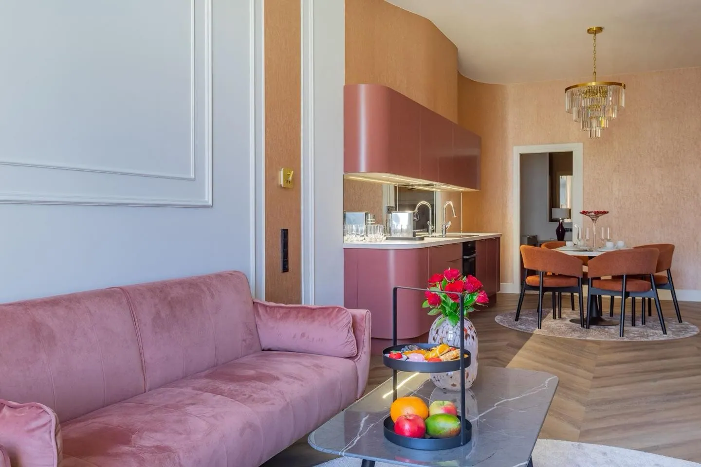 Living room with a pink sofa