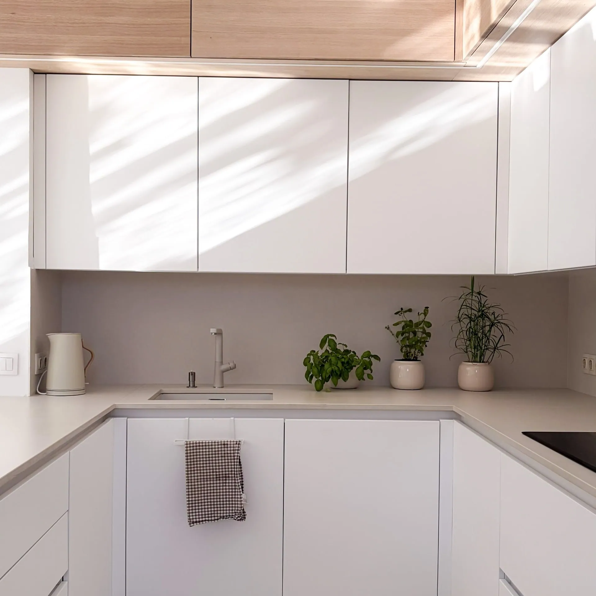 White kitchen run with a built-in sink