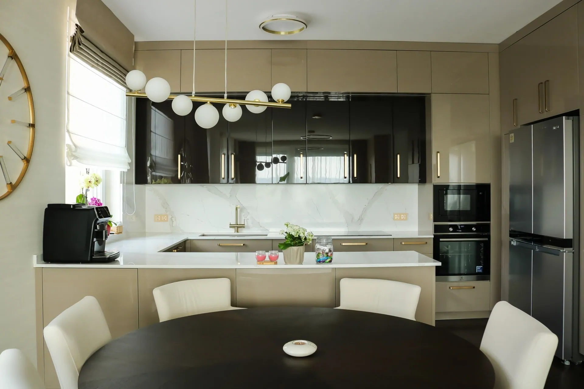 Kitchen and dining area with globe lights