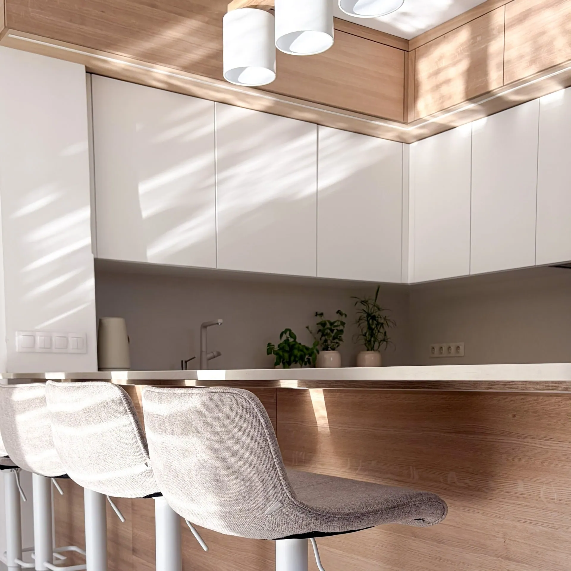 Bar stools and pendant lights in the kitchen