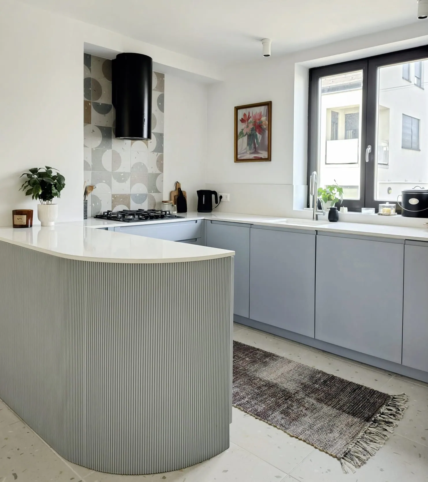 Curved, blue ribbed kitchen island