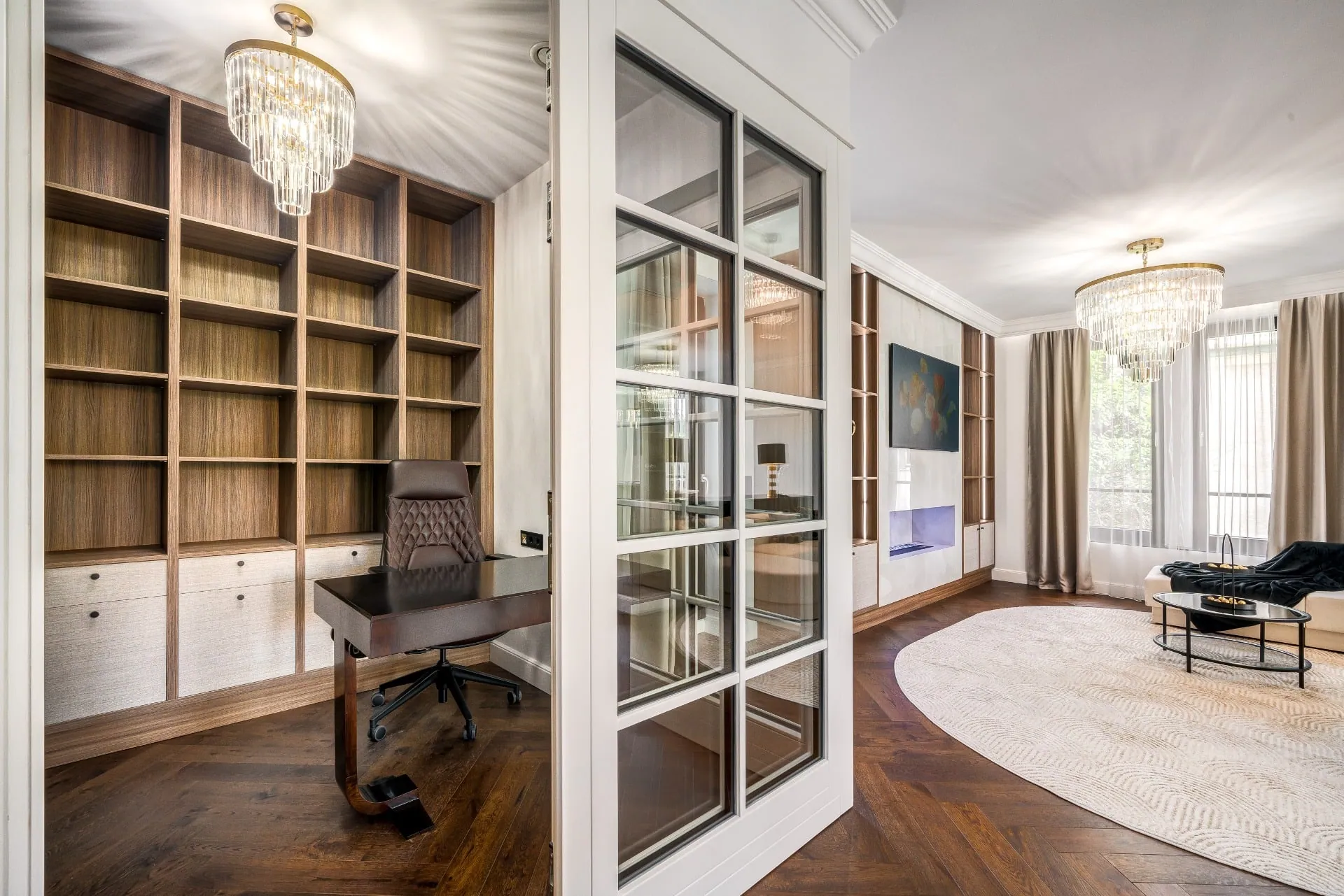 Glass-walled study area with built-in shelves
