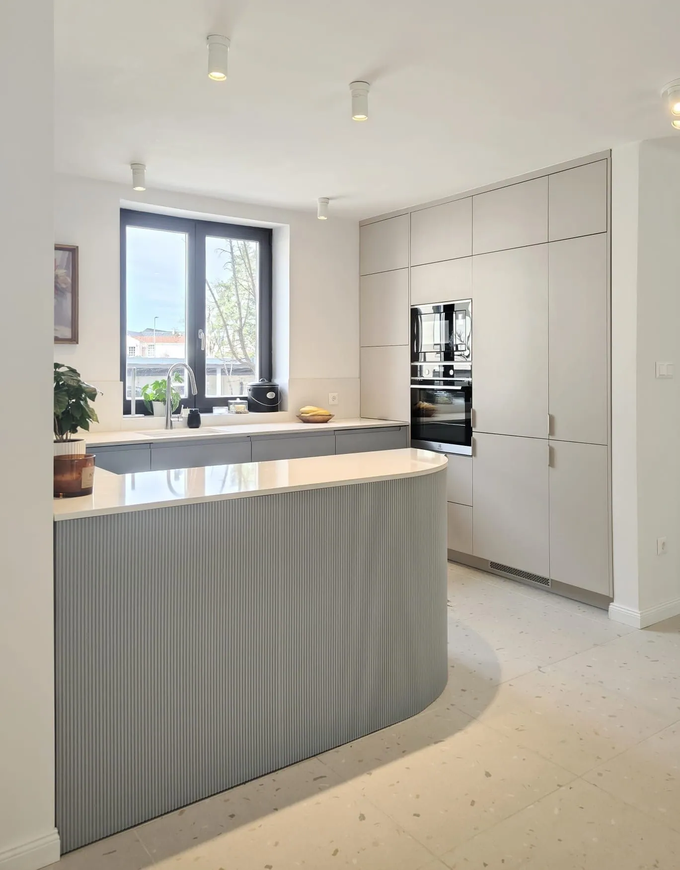 Tall cabinet run with a built-in oven