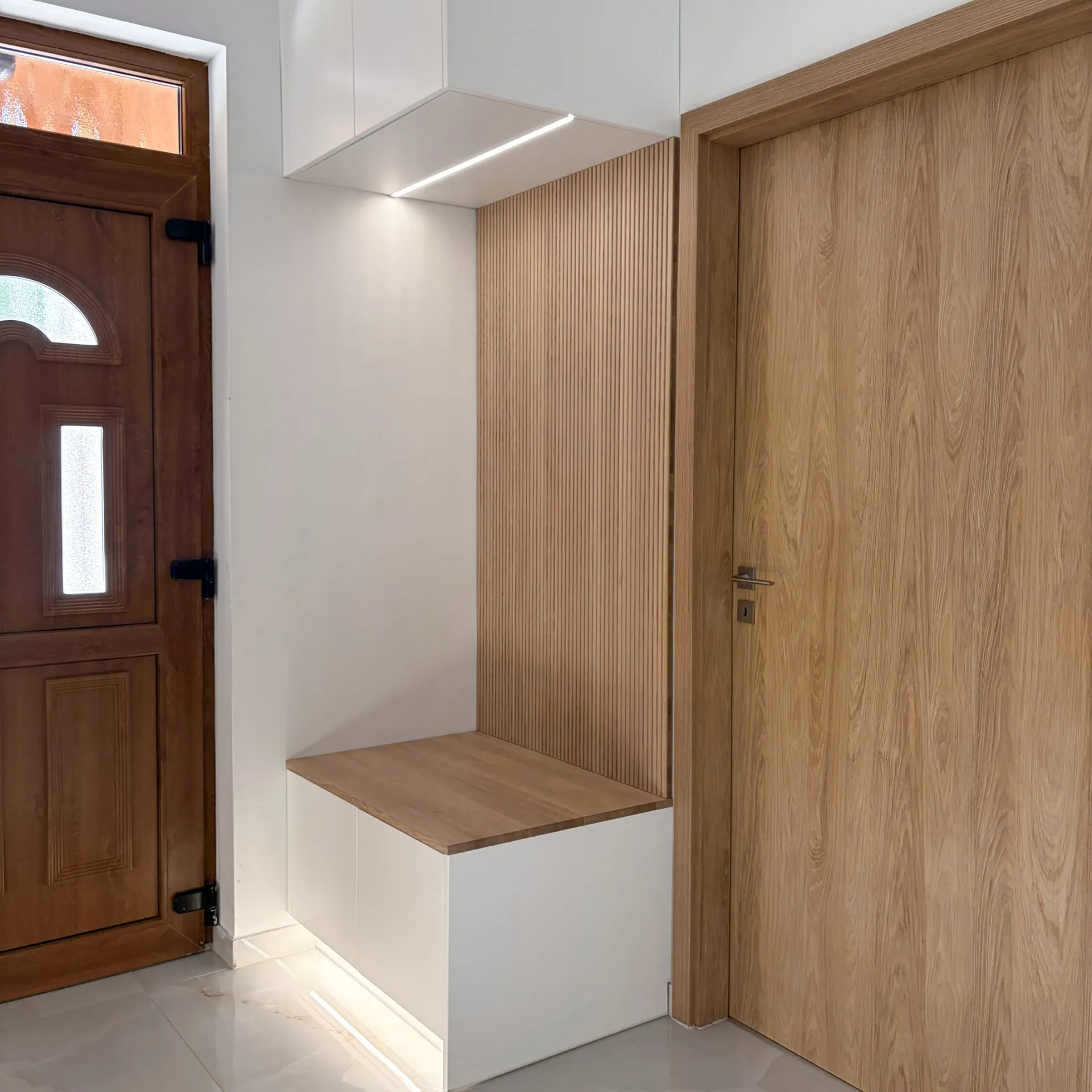 Bespoke hallway furniture with a bench and LED lighting