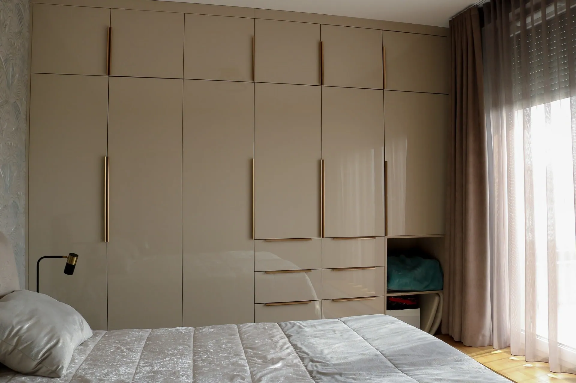 Bedroom with a floor-to-ceiling built-in wardrobe