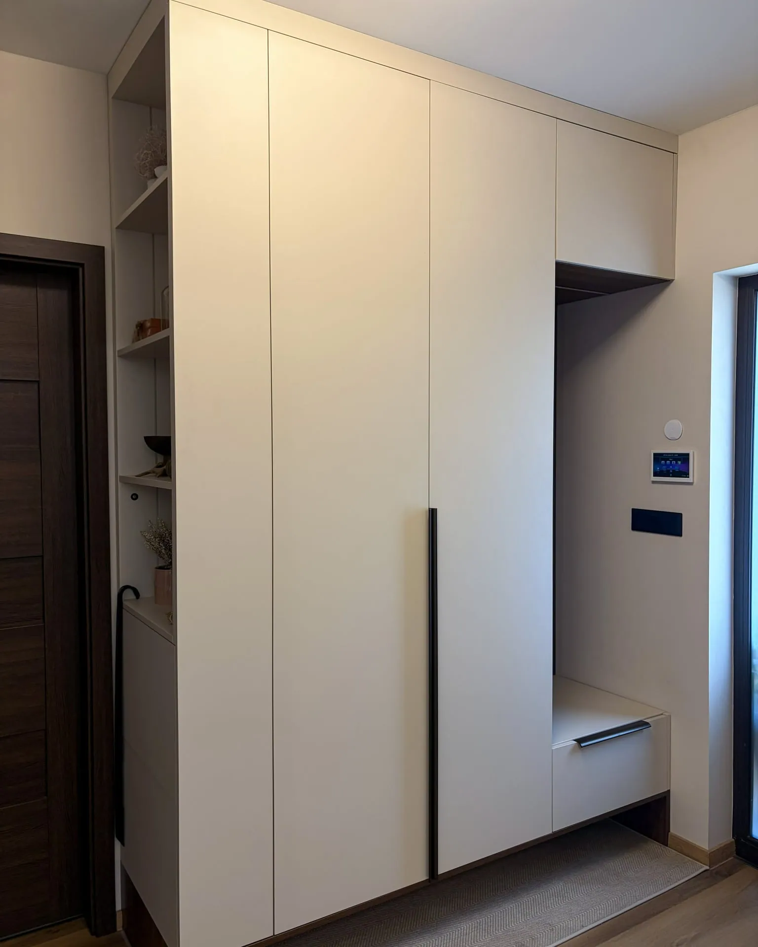 Floor-to-ceiling hallway wardrobe with open shelves