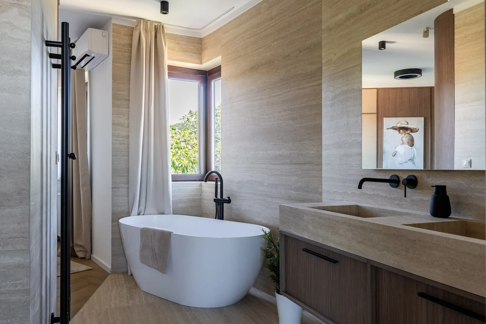 Bathroom with stone-effect surfaces and wooden vanity unit