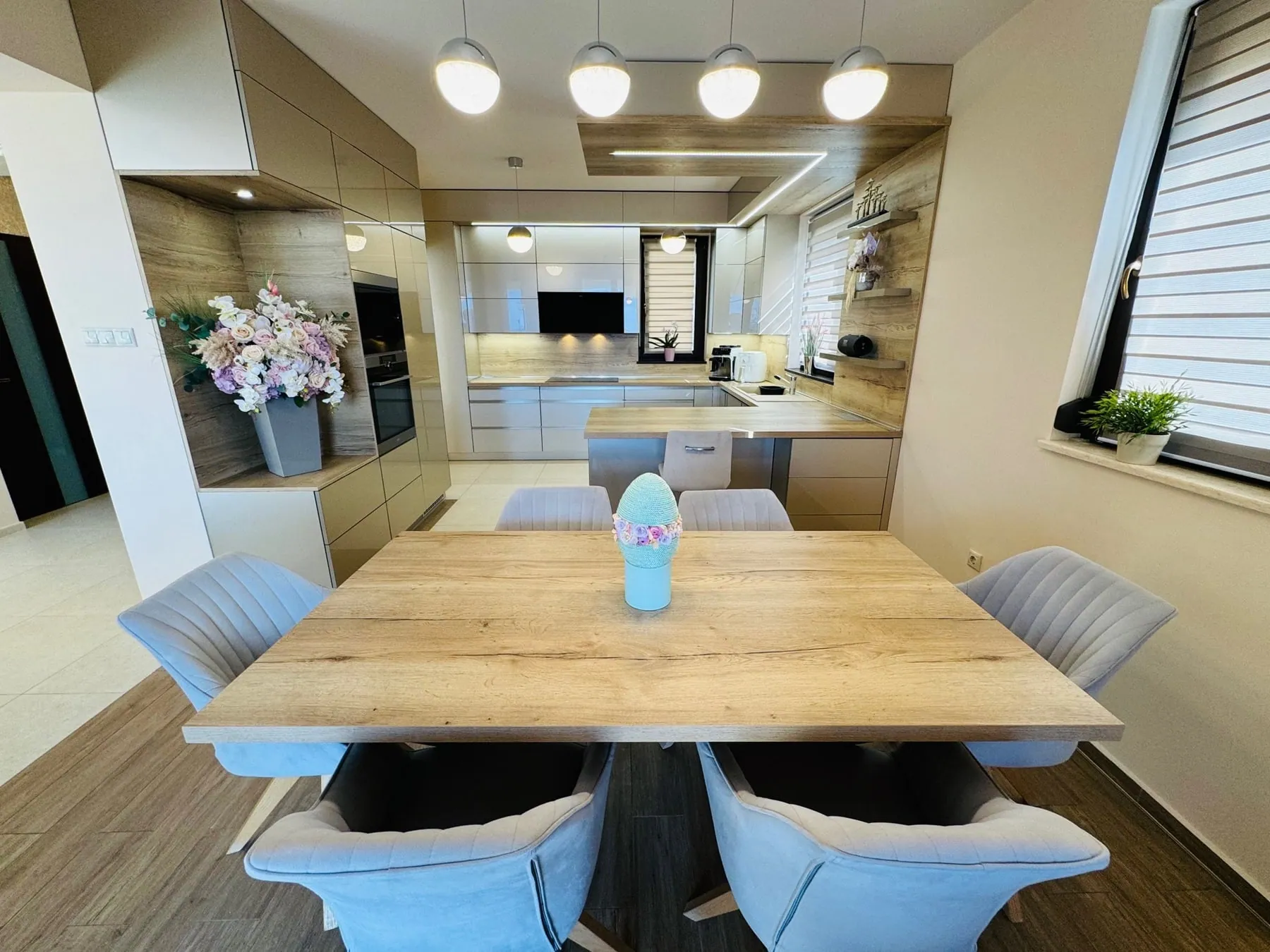Dining area with modern pendant lights