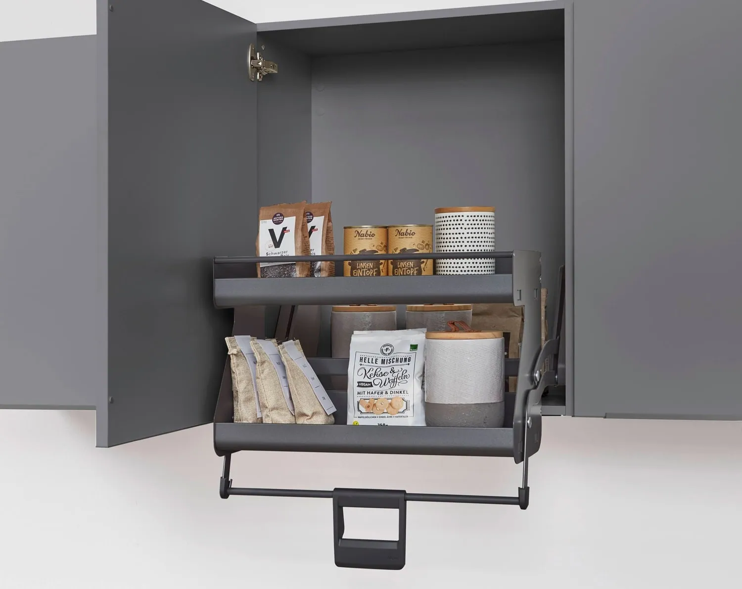 Pull-down shelf system in a wall cabinet
